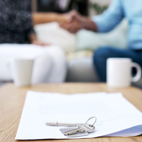 Shot of two unrecognizable people shaking hands after a successful deal.