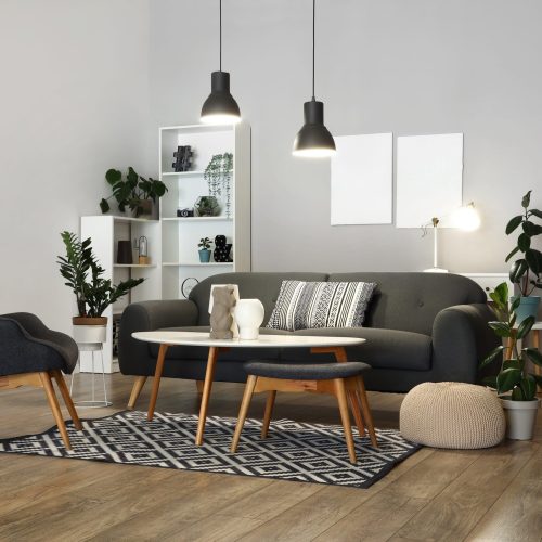 Interior,Of,Stylish,Living,Room,With,Grey,Sofa,,Armchair,And