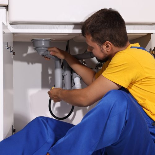 Professional,Plumber,Fixing,Piping,System,At,Home